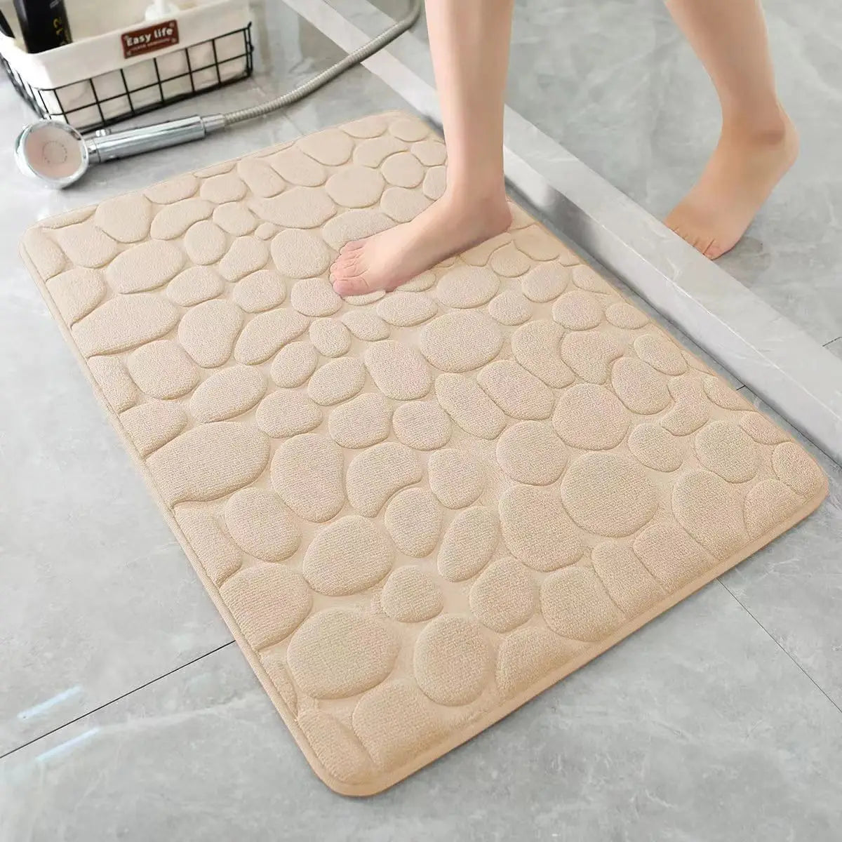 Tapis de bain galets en relief