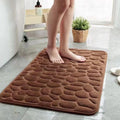 Tapis de bain galets en relief