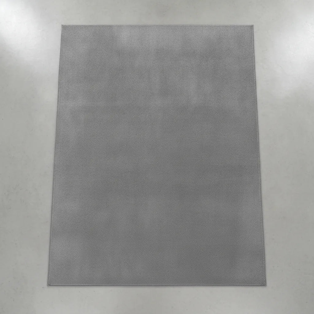 Tapis de salon uni gris poil ras