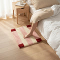 Tapis de chevet géométrique rose et beige