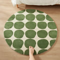 Tapis rond velours ras géométrique